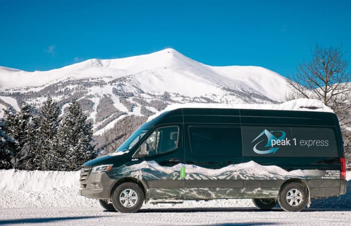 Peak 1 Express van in the Rocky Mountain snow